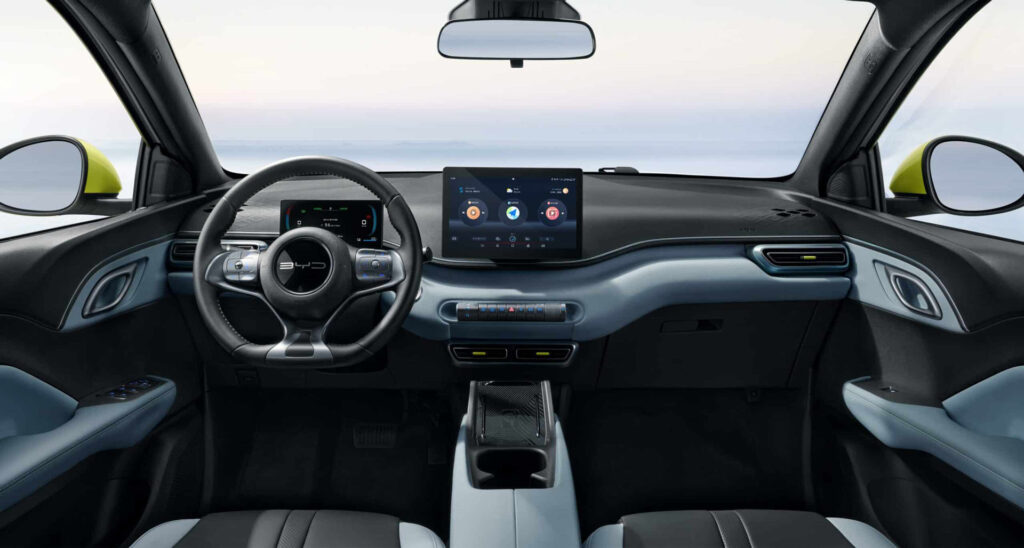 A sleek, modern interior of the BYD Seagull electric vehicle. The cabin is illuminated by soft, ambient lighting that casts a warm glow over the high-quality materials and intuitive dashboard controls. The driver's seat is positioned in front of a large, curved display showcasing the vehicle's performance data and infotainment system. In the middle, a center console houses the gear selector and various touch-sensitive buttons. The rear seats offer ample legroom and headroom, creating a comfortable and spacious passenger experience. Subtle accents of chrome and brushed aluminum add a touch of sophistication, while the panoramic glass roof floods the cabin with natural light. The overall impression is one of elegant, cutting-edge design that prioritizes both functionality and aesthetic appeal. A sleek, modern interior of the BYD Seagull electric vehicle. The cabin is illuminated by soft, ambient lighting that casts a warm glow over the high-quality materials and intuitive dashboard controls. The driver's seat is positioned in front of a large, curved display showcasing the vehicle's performance data and infotainment system. In the middle, a center console houses the gear selector and various touch-sensitive buttons. The rear seats offer ample legroom and headroom, creating a comfortable and spacious passenger experience. Subtle accents of chrome and brushed aluminum add a touch of sophistication, while the panoramic glass roof floods the cabin with natural light. The overall impression is one of elegant, cutting-edge design that prioritizes both functionality and aesthetic appeal.