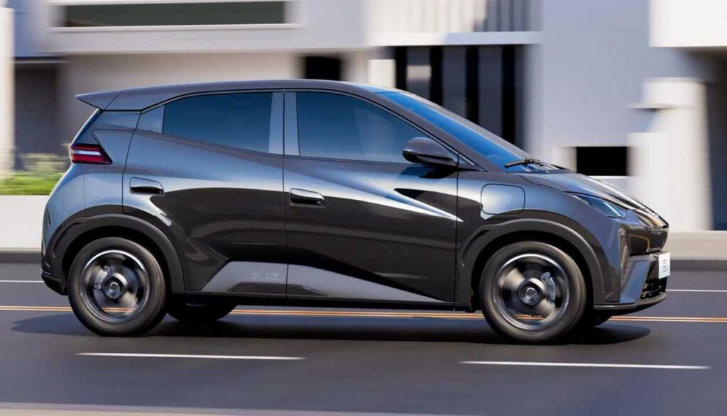 A detailed, photorealistic rendering of the BYD Seagull electric vehicle, showcasing its distinct design features. The Seagull sits prominently in the center of the frame, bathed in warm, natural lighting that accentuates its sleek, aerodynamic silhouette and vibrant color palette. The front fascia features BYD's signature grille and striking LED headlights, while the side profile highlights the vehicle's compact, city-friendly dimensions and stylish, angular lines. The rear view reveals the Seagull's unique, swept-back hatchback design and integrated taillights. The scene is set against a minimalist, clean background that allows the vehicle to be the focal point, showcasing its sophisticated, yet approachable aesthetic. A detailed, photorealistic rendering of the BYD Seagull electric vehicle, showcasing its distinct design features. The Seagull sits prominently in the center of the frame, bathed in warm, natural lighting that accentuates its sleek, aerodynamic silhouette and vibrant color palette. The front fascia features BYD's signature grille and striking LED headlights, while the side profile highlights the vehicle's compact, city-friendly dimensions and stylish, angular lines. The rear view reveals the Seagull's unique, swept-back hatchback design and integrated taillights. The scene is set against a minimalist, clean background that allows the vehicle to be the focal point, showcasing its sophisticated, yet approachable aesthetic.
